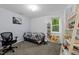 Bright bedroom featuring a unique design and comfortable furnishings at 6125 Bellow St, Raleigh, NC 27609