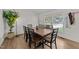 Dining room featuring a large dining table and natural light from a window at 6125 Bellow St, Raleigh, NC 27609