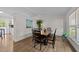 Dining area featuring a table with seating for six and natural light from window at 6125 Bellow St, Raleigh, NC 27609