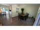 Bright dining room with modern flooring, a large picture window and contemporary decor at 6125 Bellow St, Raleigh, NC 27609