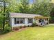 Charming single Gathering home with a covered front porch at 6125 Bellow St, Raleigh, NC 27609