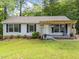 Charming single Gathering home with a covered front porch at 6125 Bellow St, Raleigh, NC 27609