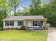 Well-maintained single Gathering home with a charming front porch at 6125 Bellow St, Raleigh, NC 27609