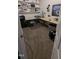 Craft/office space with carpet flooring and built in shelves at 6125 Bellow St, Raleigh, NC 27609