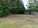 View of the yard showing a slightly sloping, grassy area at 637 Prickly Pear Dr, Fuquay Varina, NC 27526