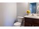 Bathroom featuring a toilet, sink and vanity at 637 Prickly Pear Dr, Fuquay Varina, NC 27526