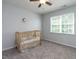 Bedroom with ceiling fan and natural light from the window at 637 Prickly Pear Dr, Fuquay Varina, NC 27526