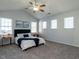 This bedroom features a ceiling fan, carpet, and natural light at 637 Prickly Pear Dr, Fuquay Varina, NC 27526