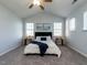 This bedroom features a vaulted ceiling, carpet, and lots of natural light at 637 Prickly Pear Dr, Fuquay Varina, NC 27526