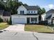 Charming two-story home with a well-maintained lawn, attached garage, and welcoming curb appeal at 637 Prickly Pear Dr, Fuquay Varina, NC 27526