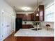 This kitchen features granite countertops and stainless steel appliances at 637 Prickly Pear Dr, Fuquay Varina, NC 27526