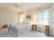 Bright bedroom with neutral decor, carpeted floors and ceiling fan at 6922 Saxby Ct, Raleigh, NC 27613