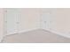 Neutral bedroom with plush carpeting and double closets provides a versatile and comfortable space at 7716 Micklewaithe Ct, Wake Forest, NC 27587