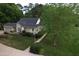 Charming single-story home with a cozy front porch and well-maintained landscaping at 7716 Micklewaithe Ct, Wake Forest, NC 27587