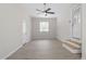 Inviting living room with neutral walls, and windows allowing natural light at 7824 Knightdale Blvd, Knightdale, NC 27545