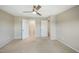 Neutral bedroom with plush carpet, ceiling fan and plenty of closet space at 805 Grafton Peak Lane Ln, Apex, NC 27523