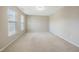 Spacious bedroom featuring natural light with a carpeted floor, and neutral walls at 805 Grafton Peak Lane Ln, Apex, NC 27523