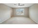 Spacious bedroom with a ceiling fan, neutral carpet and lots of natural light from the window at 805 Grafton Peak Lane Ln, Apex, NC 27523