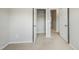 Bright bedroom with a closet and access to other rooms, showcasing a neutral color scheme at 805 Grafton Peak Lane Ln, Apex, NC 27523