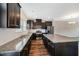 Gourmet kitchen with large island, stainless appliances, and granite countertops at 805 Grafton Peak Lane Ln, Apex, NC 27523
