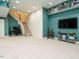 Finished basement features carpet, neutral paint, stairs, and a television area at 816 Roanoke Dr, Cary, NC 27513