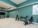 Finished basement includes exercise equipment and a television for recreation at 816 Roanoke Dr, Cary, NC 27513