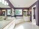 Bathroom with white hexagon tiles, a jacuzzi bathtub, shower, and a double vanity at 816 Roanoke Dr, Cary, NC 27513