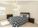 Comfortable bedroom with large bed, neutral decor, and plenty of natural light at 816 Roanoke Dr, Cary, NC 27513
