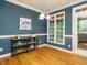 Dining area with a shelf, large window, and access to screened deck at 816 Roanoke Dr, Cary, NC 27513