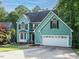 Charming two-story home featuring a 2-car garage and beautiful curb appeal at 816 Roanoke Dr, Cary, NC 27513