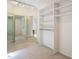 Organized walk-in closet with ample storage, including built-in shelves and mirrored corner, maximizing space at 816 Roanoke Dr, Cary, NC 27513