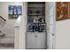 Stylish bar area with cabinetry, decorative shelves, and unique art accents adding character to the space at 820 Laurel Gate Dr, Wake Forest, NC 27587