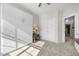Inviting bedroom with built-in storage, plush carpet, and soft, natural light creating a serene and restful ambiance at 820 Laurel Gate Dr, Wake Forest, NC 27587