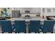 Stylish kitchen island with granite countertop and bar seating that creates a welcoming and functional space at 820 Laurel Gate Dr, Wake Forest, NC 27587