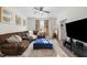 Cozy living room with modern decor, and lots of natural light, making it ideal for relaxation and entertaining at 820 Laurel Gate Dr, Wake Forest, NC 27587