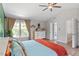 Hardwood flooring and an ensuite bathroom enhance this stylish main bedroom at 8408 Haines Creek Ln, Raleigh, NC 27616