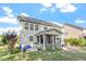 Inviting backyard features a screened porch with an outdoor dining area at 846 Lake Artesia Ln, Fuquay Varina, NC 27526