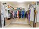 Spacious walk-in closet with organized clothing racks and shelving, offering plenty of storage at 846 Lake Artesia Ln, Fuquay Varina, NC 27526