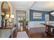 Elegant foyer with hardwood floors and an open view to dining and living areas at 846 Lake Artesia Ln, Fuquay Varina, NC 27526