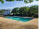 Beautiful community pool for residents offers a refreshing escape on a hot day at 8640 Neuse Landing Ln # 110, Raleigh, NC 27616