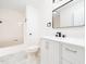 Elegant bathroom featuring a modern vanity, tiled floors, and a tub with shower at 8731 Raleigh, Benson, NC 27504