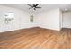 Bright living room showcasing hardwood floors and neutral paint at 8731 Raleigh, Benson, NC 27504