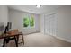 Versatile bedroom with natural light, closet, and space for desk at 9625 Collins Creek Dr, Chapel Hill, NC 27516