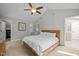 Spacious bedroom featuring a vaulted ceiling and an ensuite bathroom at 9625 Collins Creek Dr, Chapel Hill, NC 27516