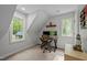 Bright office with two windows, desk, ergonomic chair, and ample natural light at 9625 Collins Creek Dr, Chapel Hill, NC 27516