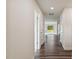 Bright hallway featuring sleek wood flooring and views to the outdoors at 0 Greensboro Chapel Hill Road Rd, Graham, NC 27253