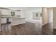 Open kitchen area showcasing stainless steel appliances and natural light at 0 Greensboro Chapel Hill Road Rd, Graham, NC 27253