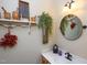 Charming bathroom featuring a vanity with a vintage mirror and decorative accents at 101 Cardinal Dr, Youngsville, NC 27596