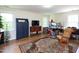 Spacious bedroom or bonus room with hardwood floors, ample natural light, and decorative furniture at 101 Cardinal Dr, Youngsville, NC 27596