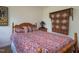 Cozy bedroom featuring a bed with Americana-themed decorations and natural wood accents at 101 Cardinal Dr, Youngsville, NC 27596